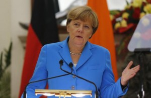 German Chancellor Angela Merkel gestures as she reads a joint statement next to India’s Prime Minister Narendra Modi (not pictured) after their delegation-level talks at Hyderabad House in New Delhi, India, October 5, 2015. REUTERS/Adnan Abidi